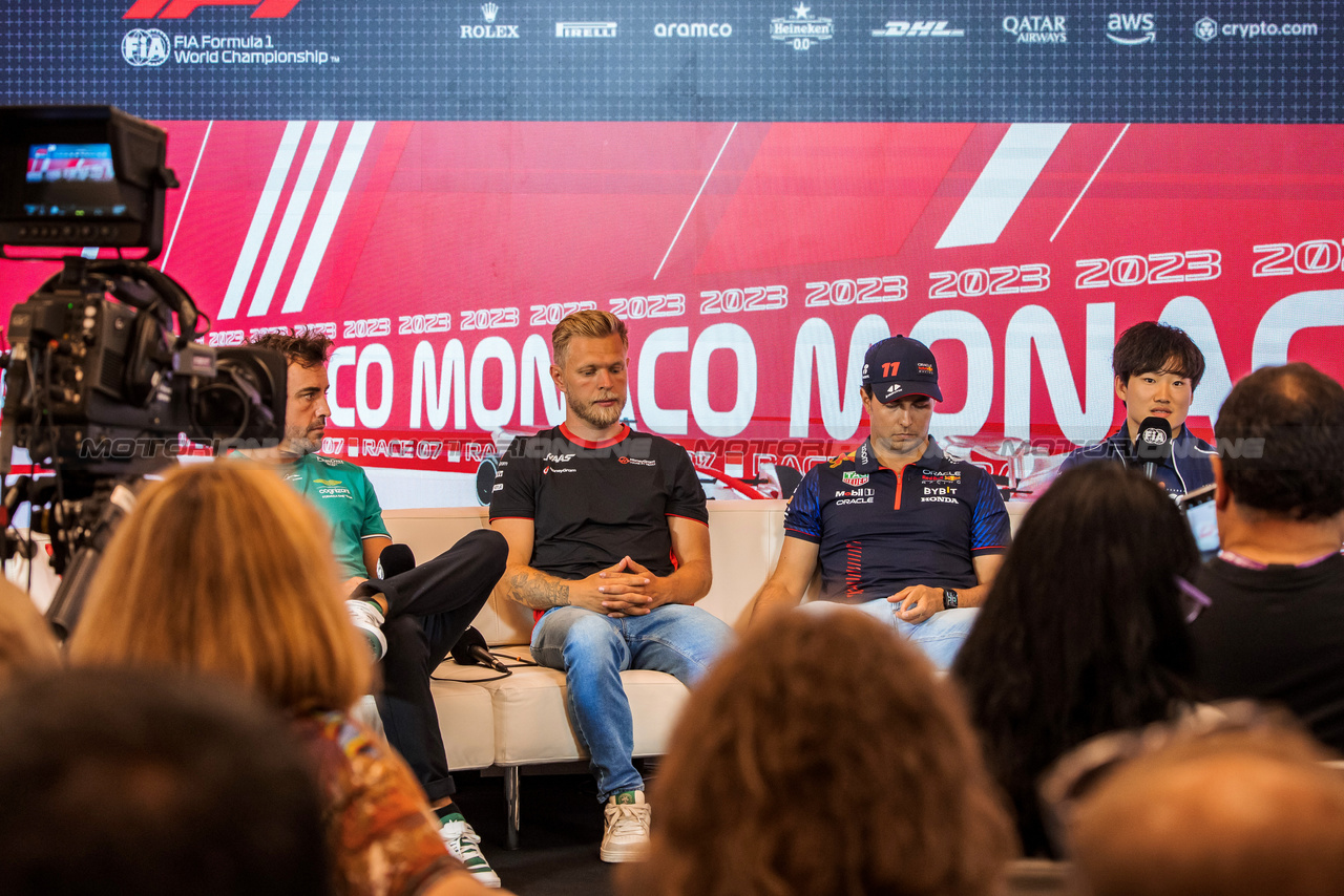GP MONACO, (L to R): Fernando Alonso (ESP) Aston Martin F1 Team; Kevin Magnussen (DEN) Haas F1 Team; Sergio Perez (MEX) Red Bull Racing; e Yuki Tsunoda (JPN) AlphaTauri, in the FIA Press Conference.

25.05.2023. Formula 1 World Championship, Rd 7, Monaco Grand Prix, Monte Carlo, Monaco, Preparation Day.

- www.xpbimages.com, EMail: requests@xpbimages.com ¬© Copyright: Bearne / XPB Images