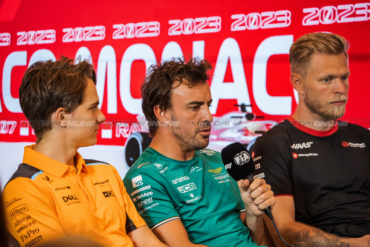 GP MONACO, (L to R): Oscar Piastri (AUS) McLaren; Fernando Alonso (ESP) Aston Martin F1 Team e Kevin Magnussen (DEN) Haas F1 Team in the FIA Press Conference.

25.05.2023. Formula 1 World Championship, Rd 7, Monaco Grand Prix, Monte Carlo, Monaco, Preparation Day.

- www.xpbimages.com, EMail: requests@xpbimages.com ¬© Copyright: Bearne / XPB Images