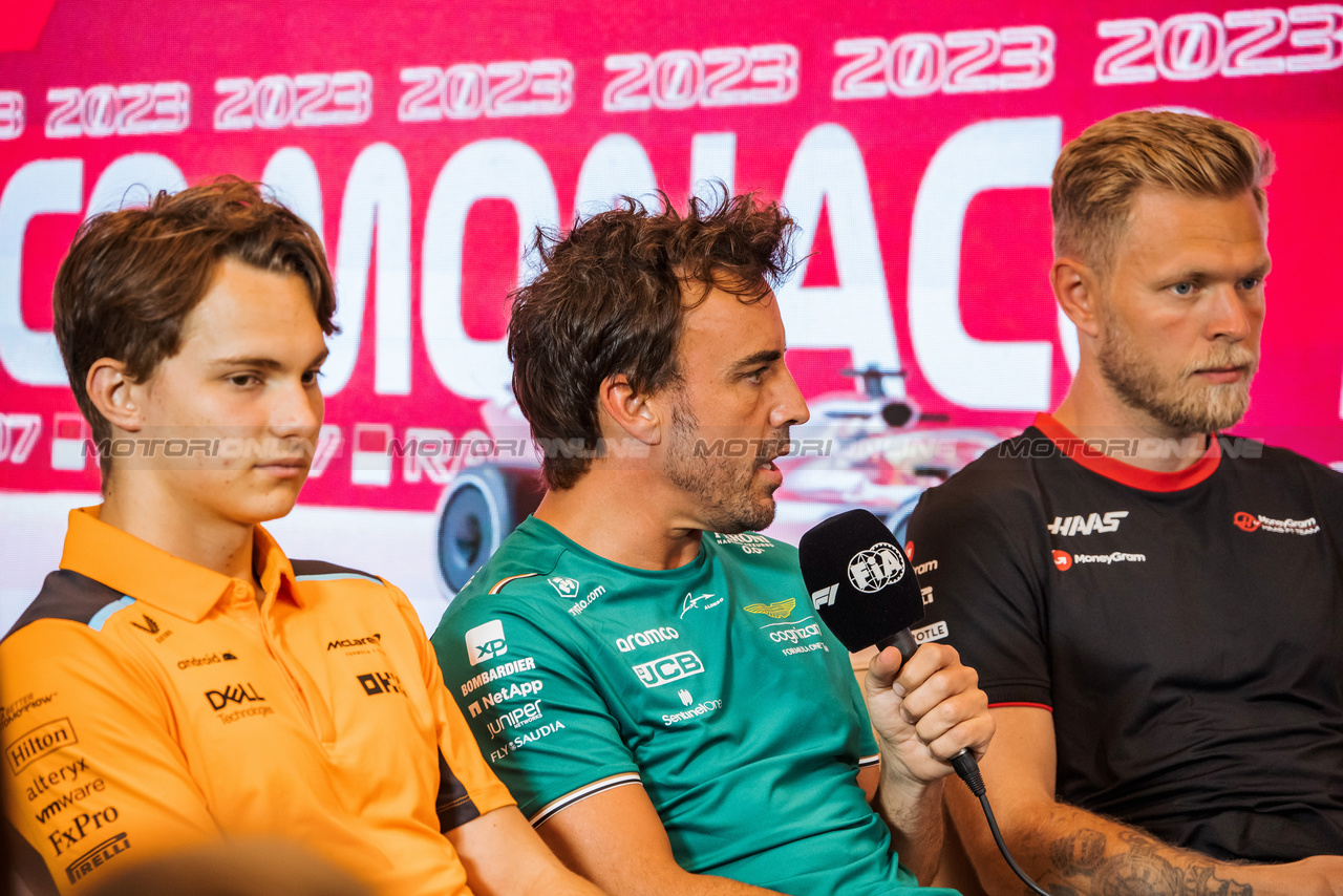 GP MONACO, (L to R): Oscar Piastri (AUS) McLaren; Fernando Alonso (ESP) Aston Martin F1 Team e Kevin Magnussen (DEN) Haas F1 Team in the FIA Press Conference.

25.05.2023. Formula 1 World Championship, Rd 7, Monaco Grand Prix, Monte Carlo, Monaco, Preparation Day.

- www.xpbimages.com, EMail: requests@xpbimages.com ¬© Copyright: Bearne / XPB Images