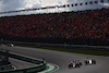 GP OLANDA, Zhou Guanyu (CHN) Alfa Romeo F1 Team C43 e Esteban Ocon (FRA) Alpine F1 Team A523 battle for position.
27.08.2023. Formula 1 World Championship, Rd 14, Dutch Grand Prix, Zandvoort, Netherlands, Gara Day.
 - www.xpbimages.com, EMail: requests@xpbimages.com © Copyright: Coates / XPB Images