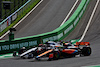 GP OLANDA, Lando Norris (GBR) McLaren MCL60 e Yuki Tsunoda (JPN) AlphaTauri AT04 battle for position.
27.08.2023. Formula 1 World Championship, Rd 14, Dutch Grand Prix, Zandvoort, Netherlands, Gara Day.
 - www.xpbimages.com, EMail: requests@xpbimages.com © Copyright: Coates / XPB Images