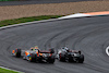 GP OLANDA, George Russell (GBR) Mercedes AMG F1 W14 e Oscar Piastri (AUS) McLaren MCL60 battle for position.
27.08.2023. Formula 1 World Championship, Rd 14, Dutch Grand Prix, Zandvoort, Netherlands, Gara Day.
 - www.xpbimages.com, EMail: requests@xpbimages.com © Copyright: Coates / XPB Images