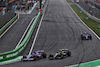 GP OLANDA, Esteban Ocon (FRA) Alpine F1 Team A523 e Lewis Hamilton (GBR) Mercedes AMG F1 W14.
27.08.2023. Formula 1 World Championship, Rd 14, Dutch Grand Prix, Zandvoort, Netherlands, Gara Day.
 - www.xpbimages.com, EMail: requests@xpbimages.com © Copyright: Coates / XPB Images