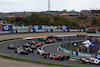 GP OLANDA, Zhou Guanyu (CHN) Alfa Romeo F1 Team C43 e Valtteri Bottas (FIN) Alfa Romeo F1 Team C43 at the partenza of the race.
27.08.2023. Formula 1 World Championship, Rd 14, Dutch Grand Prix, Zandvoort, Netherlands, Gara Day.
 - www.xpbimages.com, EMail: requests@xpbimages.com © Copyright: Coates / XPB Images
