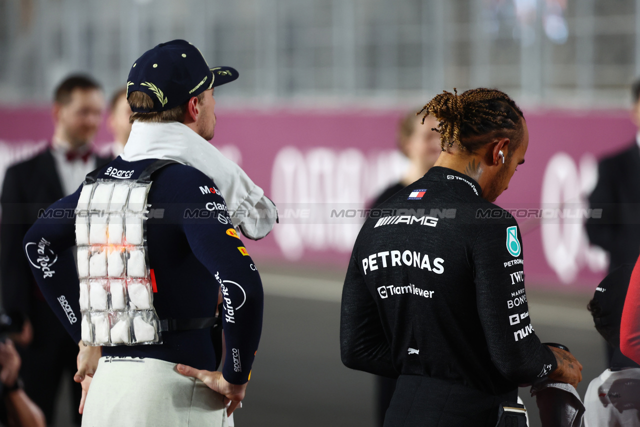 GP QATAR, (L to R): Max Verstappen (NLD) Red Bull Racing with Lewis Hamilton (GBR) Mercedes AMG F1 on the drivers' parade.

08.10.2023. Formula 1 World Championship, Rd 18, Qatar Grand Prix, Doha, Qatar, Gara Day.

- www.xpbimages.com, EMail: requests@xpbimages.com © Copyright: Batchelor / XPB Images