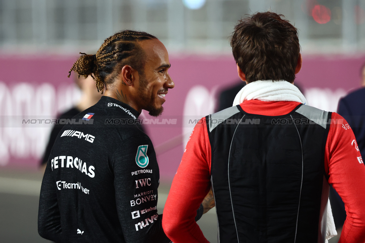 GP QATAR, (L to R): Lewis Hamilton (GBR) Mercedes AMG F1 with Charles Leclerc (MON) Ferrari on the drivers' parade.

08.10.2023. Formula 1 World Championship, Rd 18, Qatar Grand Prix, Doha, Qatar, Gara Day.

- www.xpbimages.com, EMail: requests@xpbimages.com © Copyright: Batchelor / XPB Images