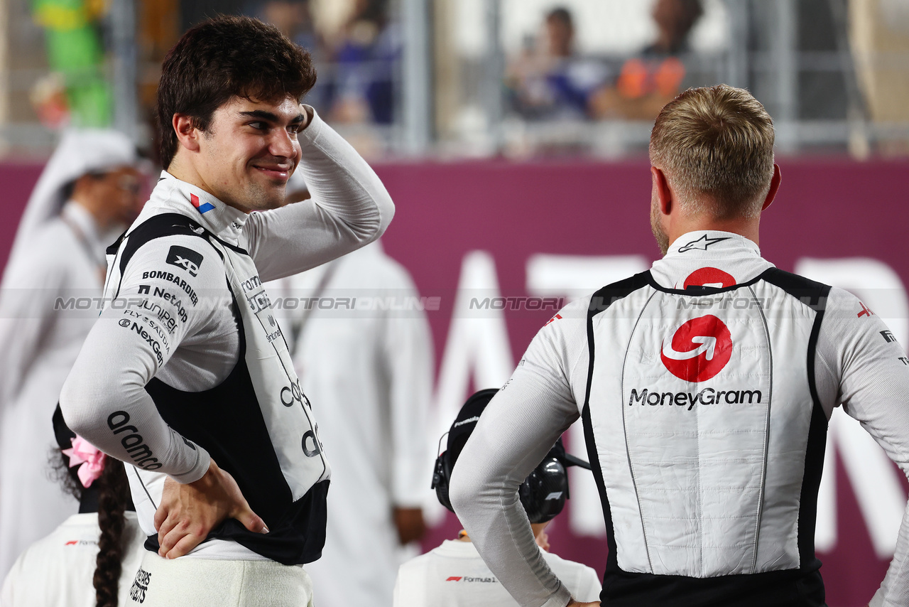 GP QATAR, (L to R): Lance Stroll (CDN) Aston Martin F1 Team with Kevin Magnussen (DEN) Haas F1 Team on the drivers' parade.

08.10.2023. Formula 1 World Championship, Rd 18, Qatar Grand Prix, Doha, Qatar, Gara Day.

- www.xpbimages.com, EMail: requests@xpbimages.com © Copyright: Batchelor / XPB Images