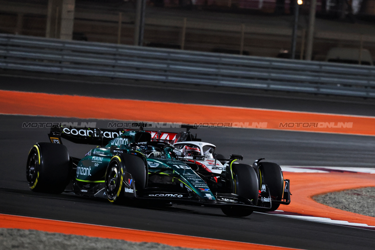 GP QATAR, Lance Stroll (CDN) Aston Martin F1 Team AMR23 e Kevin Magnussen (DEN) Haas VF-23 battle for position.

08.10.2023. Formula 1 World Championship, Rd 18, Qatar Grand Prix, Doha, Qatar, Gara Day.

- www.xpbimages.com, EMail: requests@xpbimages.com © Copyright: Charniaux / XPB Images