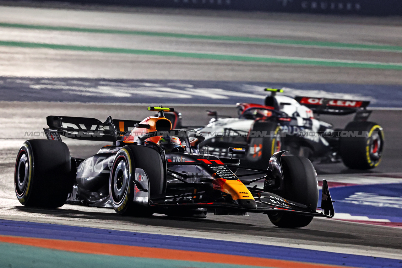 GP QATAR, Sergio Perez (MEX) Red Bull Racing RB19.

08.10.2023. Formula 1 World Championship, Rd 18, Qatar Grand Prix, Doha, Qatar, Gara Day.

- www.xpbimages.com, EMail: requests@xpbimages.com © Copyright: Charniaux / XPB Images