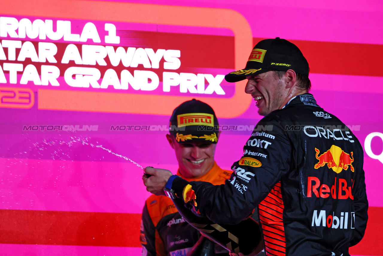 GP QATAR, Gara winner Max Verstappen (NLD) Red Bull Racing celebrates on the podium.

08.10.2023. Formula 1 World Championship, Rd 18, Qatar Grand Prix, Doha, Qatar, Gara Day.

 - www.xpbimages.com, EMail: requests@xpbimages.com © Copyright: Coates / XPB Images