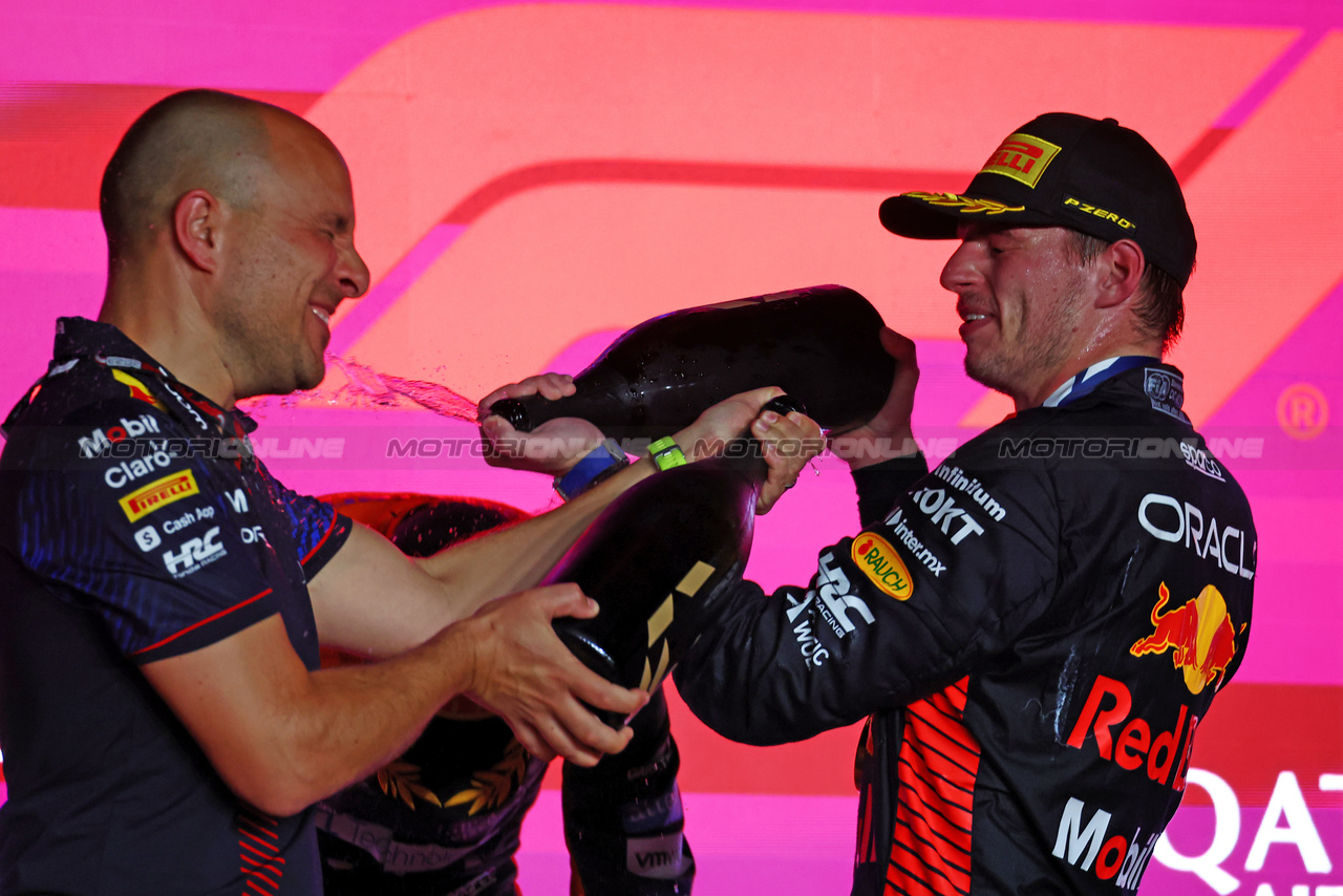 GP QATAR, Gara winner Max Verstappen (NLD) Red Bull Racing celebrates on the podium with Gianpiero Lambiase (ITA) Red Bull Racing Engineer.

08.10.2023. Formula 1 World Championship, Rd 18, Qatar Grand Prix, Doha, Qatar, Gara Day.

 - www.xpbimages.com, EMail: requests@xpbimages.com © Copyright: Coates / XPB Images