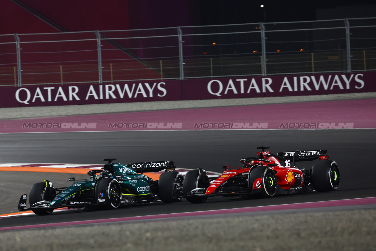 GP QATAR, (L to R): Lance Stroll (CDN) Aston Martin F1 Team AMR23 e Charles Leclerc (MON) Ferrari SF-23 battle for position.

08.10.2023. Formula 1 World Championship, Rd 18, Qatar Grand Prix, Doha, Qatar, Gara Day.

 - www.xpbimages.com, EMail: requests@xpbimages.com © Copyright: Coates / XPB Images