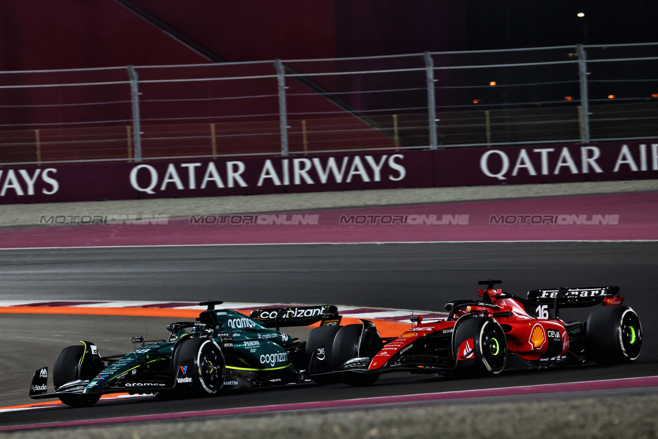 GP QATAR, (L to R): Lance Stroll (CDN) Aston Martin F1 Team AMR23 e Charles Leclerc (MON) Ferrari SF-23 battle for position.

08.10.2023. Formula 1 World Championship, Rd 18, Qatar Grand Prix, Doha, Qatar, Gara Day.

 - www.xpbimages.com, EMail: requests@xpbimages.com © Copyright: Coates / XPB Images