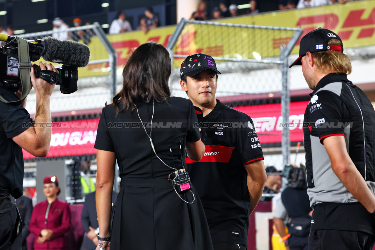 GP QATAR, (L to R): Zhou Guanyu (CHN) Alfa Romeo F1 Team e Valtteri Bottas (FIN) Alfa Romeo F1 Team on the drivers' parade.

08.10.2023. Formula 1 World Championship, Rd 18, Qatar Grand Prix, Doha, Qatar, Gara Day.

 - www.xpbimages.com, EMail: requests@xpbimages.com © Copyright: Coates / XPB Images