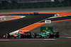 GP QATAR, Lance Stroll (CDN) Aston Martin F1 Team AMR23 e Oscar Piastri (AUS) McLaren MCL60 battle for position.
08.10.2023. Formula 1 World Championship, Rd 18, Qatar Grand Prix, Doha, Qatar, Gara Day.
 - www.xpbimages.com, EMail: requests@xpbimages.com © Copyright: Coates / XPB Images