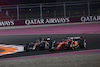 GP QATAR, Valtteri Bottas (FIN) Alfa Romeo F1 Team C43 e Charles Leclerc (MON) Ferrari SF-23 battle for position.
08.10.2023. Formula 1 World Championship, Rd 18, Qatar Grand Prix, Doha, Qatar, Gara Day.
 - www.xpbimages.com, EMail: requests@xpbimages.com © Copyright: Coates / XPB Images