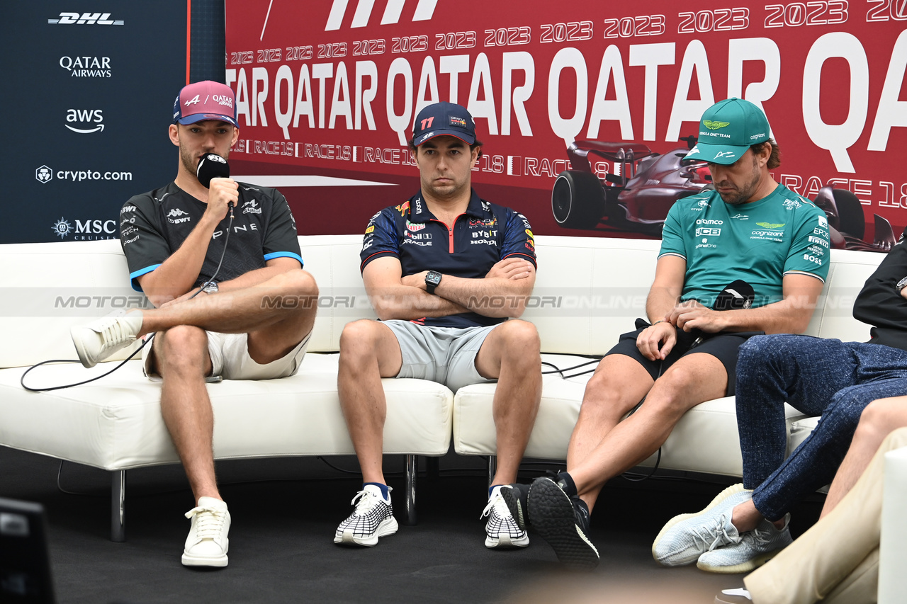 GP QATAR, (L to R): Pierre Gasly (FRA) Alpine F1 Team; Sergio Perez (MEX) Red Bull Racing; e Fernando Alonso (ESP) Aston Martin F1 Team, in the FIA Press Conference.

05.10.2023. Formula 1 World Championship, Rd 18, Qatar Grand Prix, Doha, Qatar, Preparation Day.

- www.xpbimages.com, EMail: requests@xpbimages.com © Copyright: XPB Images