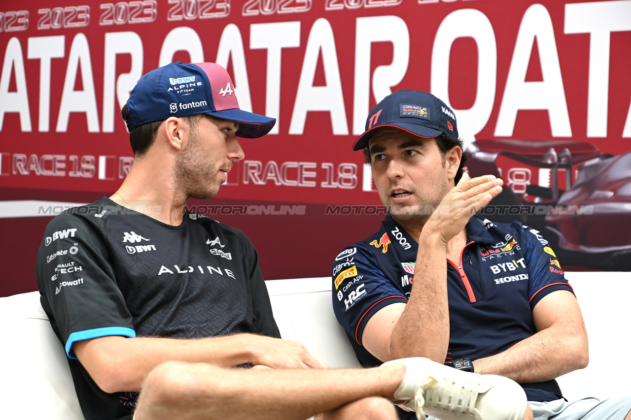 GP QATAR, (L to R): Pierre Gasly (FRA) Alpine F1 Team e Sergio Perez (MEX) Red Bull Racing in the FIA Press Conference.

05.10.2023. Formula 1 World Championship, Rd 18, Qatar Grand Prix, Doha, Qatar, Preparation Day.

- www.xpbimages.com, EMail: requests@xpbimages.com © Copyright: XPB Images
