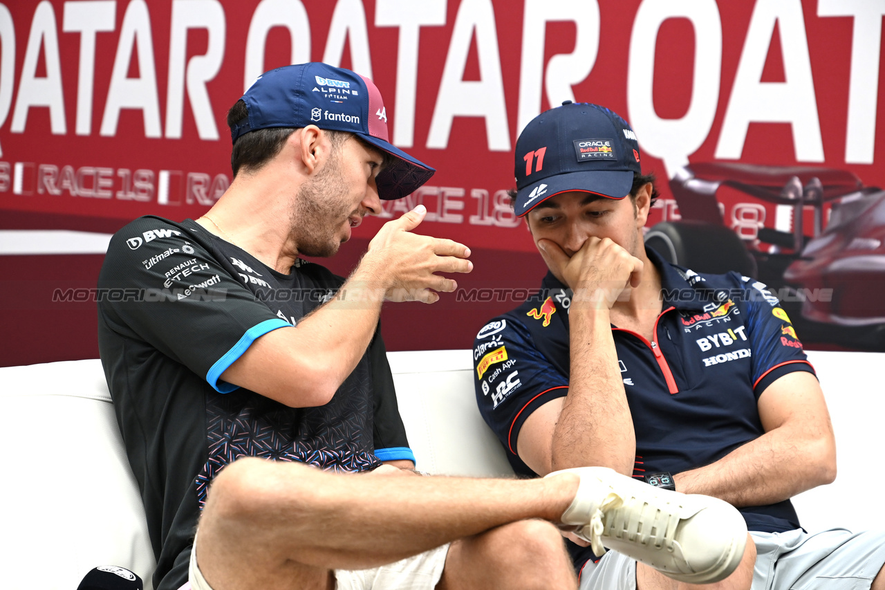 GP QATAR, (L to R): Pierre Gasly (FRA) Alpine F1 Team e Sergio Perez (MEX) Red Bull Racing in the FIA Press Conference.

05.10.2023. Formula 1 World Championship, Rd 18, Qatar Grand Prix, Doha, Qatar, Preparation Day.

- www.xpbimages.com, EMail: requests@xpbimages.com © Copyright: XPB Images