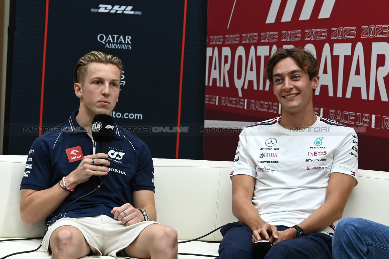 GP QATAR, (L to R): Liam Lawson (NZL) AlphaTauri e George Russell (GBR) Mercedes AMG F1 in the FIA Press Conference.

05.10.2023. Formula 1 World Championship, Rd 18, Qatar Grand Prix, Doha, Qatar, Preparation Day.

- www.xpbimages.com, EMail: requests@xpbimages.com © Copyright: XPB Images