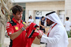 GP QATAR, Charles Leclerc (MON) Ferrari with a fan.
05.10.2023. Formula 1 World Championship, Rd 18, Qatar Grand Prix, Doha, Qatar, Preparation Day.
- www.xpbimages.com, EMail: requests@xpbimages.com © Copyright: Moy / XPB Images