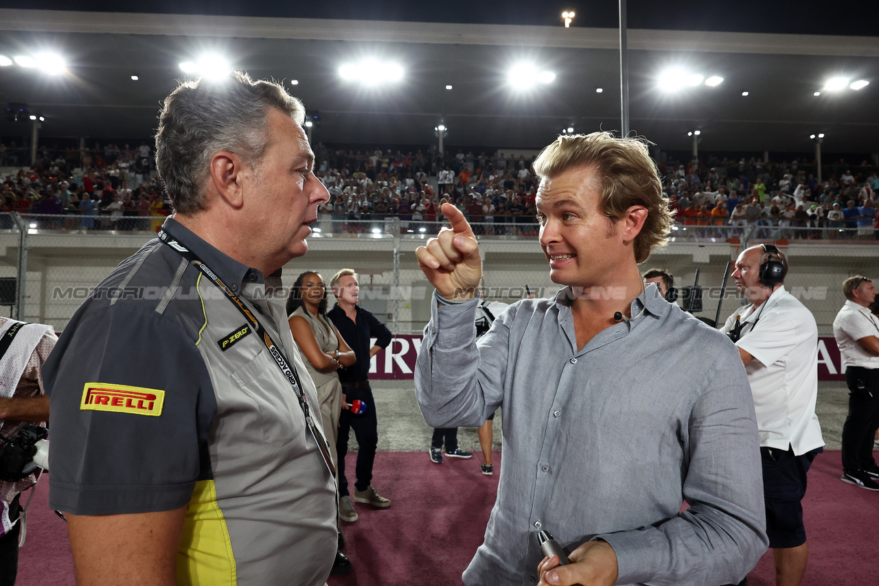 GP QATAR, (L to R): Mario Isola (ITA) Pirelli Racing Manager with Nico Rosberg (GER).

07.10.2023. Formula 1 World Championship, Rd 18, Qatar Grand Prix, Doha, Qatar, Sprint Day.

- www.xpbimages.com, EMail: requests@xpbimages.com © Copyright: Moy / XPB Images