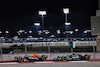GP QATAR, Sergio Perez (MEX) Red Bull Racing RB19 e Lewis Hamilton (GBR) Mercedes AMG F1 W14.
07.10.2023. Formula 1 World Championship, Rd 18, Qatar Grand Prix, Doha, Qatar, Sprint Day.
 - www.xpbimages.com, EMail: requests@xpbimages.com © Copyright: Coates / XPB Images
