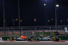 GP QATAR, Sergio Perez (MEX) Red Bull Racing RB19 e Lewis Hamilton (GBR) Mercedes AMG F1 W14.
07.10.2023. Formula 1 World Championship, Rd 18, Qatar Grand Prix, Doha, Qatar, Sprint Day.
 - www.xpbimages.com, EMail: requests@xpbimages.com © Copyright: Coates / XPB Images