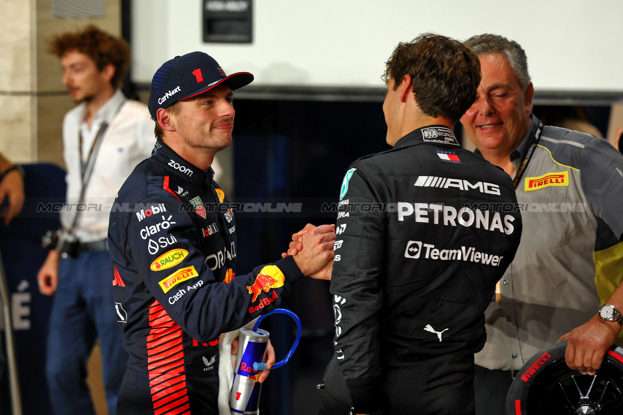 GP QATAR, (L to R): Pole sitter Max Verstappen (NLD) Red Bull Racing with George Russell (GBR) Mercedes AMG F1 in qualifying parc ferme.

06.10.2023 Formula 1 World Championship, Rd 18, Qatar Grand Prix, Doha, Qatar, Qualifiche Day.

- www.xpbimages.com, EMail: requests@xpbimages.com © Copyright: Batchelor / XPB Images
