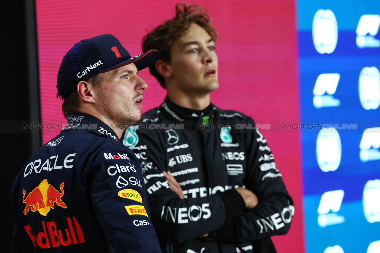 GP QATAR, (L to R): Pole sitter Max Verstappen (NLD) Red Bull Racing with George Russell (GBR) Mercedes AMG F1 in qualifying parc ferme.

06.10.2023 Formula 1 World Championship, Rd 18, Qatar Grand Prix, Doha, Qatar, Qualifiche Day.

 - www.xpbimages.com, EMail: requests@xpbimages.com © Copyright: Coates / XPB Images