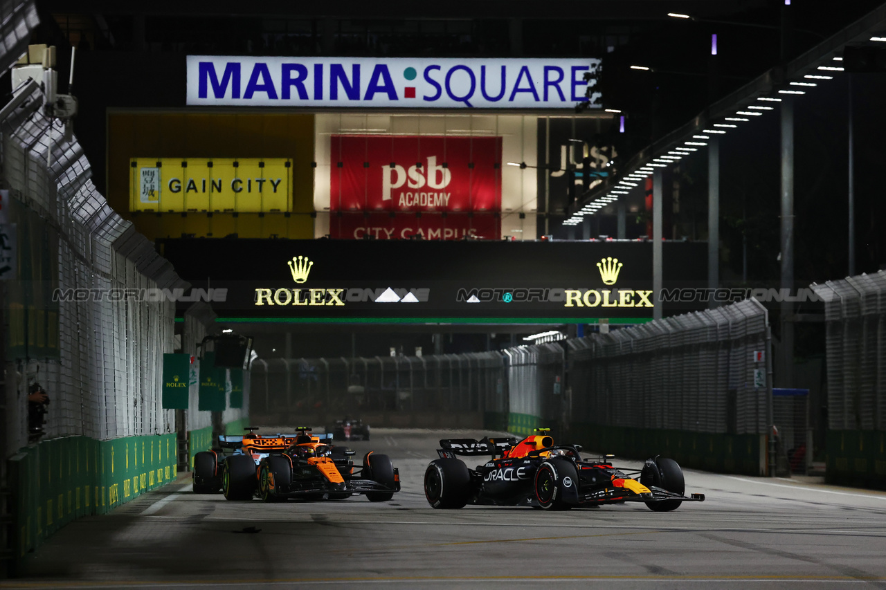 GP SINGAPORE, Sergio Perez (MEX) Red Bull Racing RB19.

17.09.2023. Formula 1 World Championship, Rd 16, Singapore Grand Prix, Marina Bay Street Circuit, Singapore, Gara Day.

- www.xpbimages.com, EMail: requests@xpbimages.com © Copyright: Moy / XPB Images