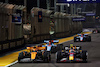 GP SINGAPORE, (L to R): Oscar Piastri (AUS) McLaren MCL60 e Sergio Perez (MEX) Red Bull Racing RB19.
17.09.2023. Formula 1 World Championship, Rd 16, Singapore Grand Prix, Marina Bay Street Circuit, Singapore, Gara Day.
- www.xpbimages.com, EMail: requests@xpbimages.com © Copyright: Batchelor / XPB Images