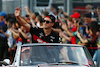 GP SINGAPORE, Zhou Guanyu (CHN) Alfa Romeo F1 Team on the drivers' parade.
17.09.2023. Formula 1 World Championship, Rd 16, Singapore Grand Prix, Marina Bay Street Circuit, Singapore, Gara Day.
 - www.xpbimages.com, EMail: requests@xpbimages.com © Copyright: Coates / XPB Images