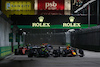 GP SINGAPORE, Lewis Hamilton (GBR) Mercedes AMG F1 W14 e Sergio Perez (MEX) Red Bull Racing RB19 battle for position.
17.09.2023. Formula 1 World Championship, Rd 16, Singapore Grand Prix, Marina Bay Street Circuit, Singapore, Gara Day.
- www.xpbimages.com, EMail: requests@xpbimages.com © Copyright: Moy / XPB Images