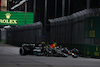 GP SINGAPORE, Lewis Hamilton (GBR) Mercedes AMG F1 W14 e Sergio Perez (MEX) Red Bull Racing RB19 battle for position.
17.09.2023. Formula 1 World Championship, Rd 16, Singapore Grand Prix, Marina Bay Street Circuit, Singapore, Gara Day.
- www.xpbimages.com, EMail: requests@xpbimages.com © Copyright: Moy / XPB Images