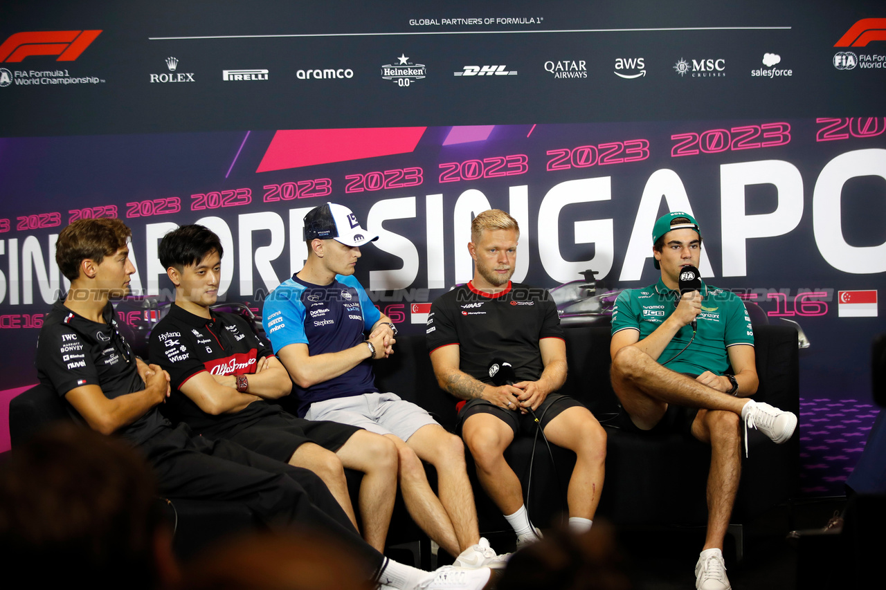 GP SINGAPORE, (L to R): George Russell (GBR) Mercedes AMG F1; Zhou Guanyu (CHN) Alfa Romeo F1 Team; Logan Sargeant (USA) Williams Racing; Kevin Magnussen (DEN) Haas F1 Team, e Lance Stroll (CDN) Aston Martin F1 Team in the FIA Press Conference.

14.09.2023. Formula 1 World Championship, Rd 16, Singapore Grand Prix, Marina Bay Street Circuit, Singapore, Preparation Day.

- www.xpbimages.com, EMail: requests@xpbimages.com © Copyright: XPB Images