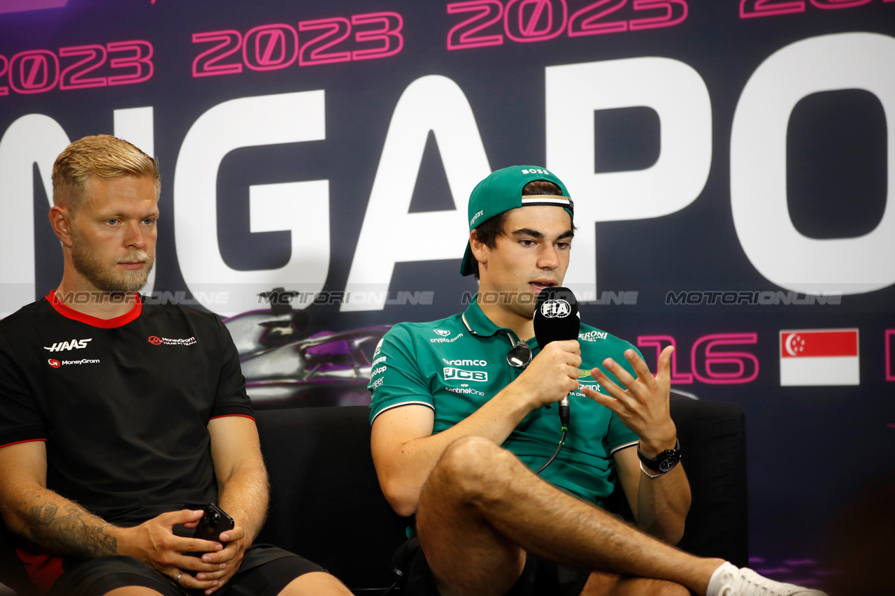 GP SINGAPORE, (L to R): Kevin Magnussen (DEN) Haas F1 Team e Lance Stroll (CDN) Aston Martin F1 Team in the FIA Press Conference.

14.09.2023. Formula 1 World Championship, Rd 16, Singapore Grand Prix, Marina Bay Street Circuit, Singapore, Preparation Day.

- www.xpbimages.com, EMail: requests@xpbimages.com © Copyright: XPB Images