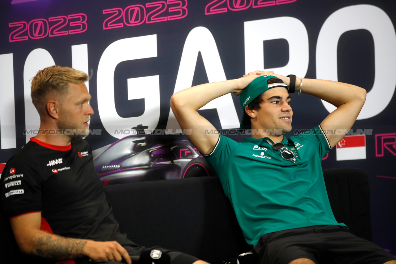 GP SINGAPORE, Lance Stroll (CDN) Aston Martin F1 Team (Right) e Kevin Magnussen (DEN) Haas F1 Team in the FIA Press Conference.

14.09.2023. Formula 1 World Championship, Rd 16, Singapore Grand Prix, Marina Bay Street Circuit, Singapore, Preparation Day.

- www.xpbimages.com, EMail: requests@xpbimages.com © Copyright: XPB Images