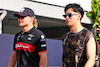 GP SINGAPORE, (L to R): Valtteri Bottas (FIN) Alfa Romeo F1 Team with Zhou Guanyu (CHN) Alfa Romeo F1 Team.
14.09.2023. Formula 1 World Championship, Rd 16, Singapore Grand Prix, Marina Bay Street Circuit, Singapore, Preparation Day.
 - www.xpbimages.com, EMail: requests@xpbimages.com © Copyright: Coates / XPB Images