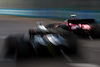 GP SINGAPORE, Liam Lawson (NZL) AlphaTauri AT04 e Carlos Sainz Jr (ESP) Ferrari SF-23.
16.09.2023. Formula 1 World Championship, Rd 16, Singapore Grand Prix, Marina Bay Street Circuit, Singapore, Qualifiche Day.
 - www.xpbimages.com, EMail: requests@xpbimages.com © Copyright: Coates / XPB Images