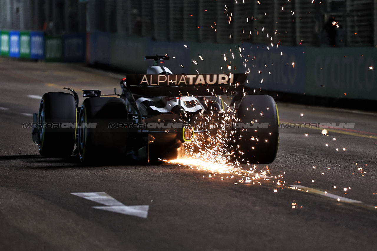 GP SINGAPORE, Liam Lawson (NZL) AlphaTauri AT04 sends sparks flying.

15.09.2023. Formula 1 World Championship, Rd 16, Singapore Grand Prix, Marina Bay Street Circuit, Singapore, Practice Day.

 - www.xpbimages.com, EMail: requests@xpbimages.com © Copyright: Coates / XPB Images