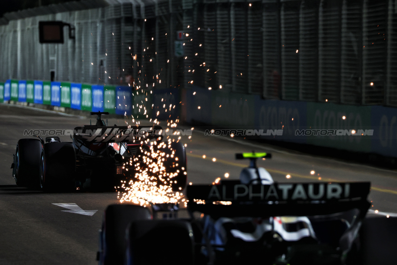 GP SINGAPORE, Kevin Magnussen (DEN) Haas VF-23 sends sparks flying.

15.09.2023. Formula 1 World Championship, Rd 16, Singapore Grand Prix, Marina Bay Street Circuit, Singapore, Practice Day.

 - www.xpbimages.com, EMail: requests@xpbimages.com © Copyright: Coates / XPB Images
