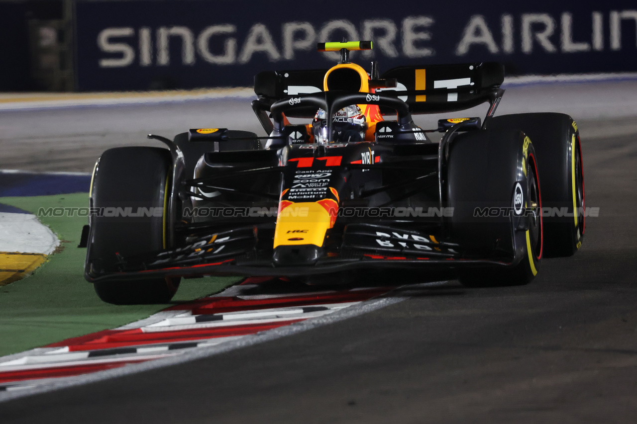 GP SINGAPORE, Sergio Perez (MEX) Red Bull Racing RB19.

15.09.2023. Formula 1 World Championship, Rd 16, Singapore Grand Prix, Marina Bay Street Circuit, Singapore, Practice Day.

- www.xpbimages.com, EMail: requests@xpbimages.com © Copyright: Batchelor / XPB Images