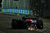 GP SINGAPORE, Lando Norris (GBR) McLaren MCL60 sends sparks flying.
15.09.2023. Formula 1 World Championship, Rd 16, Singapore Grand Prix, Marina Bay Street Circuit, Singapore, Practice Day.
 - www.xpbimages.com, EMail: requests@xpbimages.com © Copyright: Coates / XPB Images
