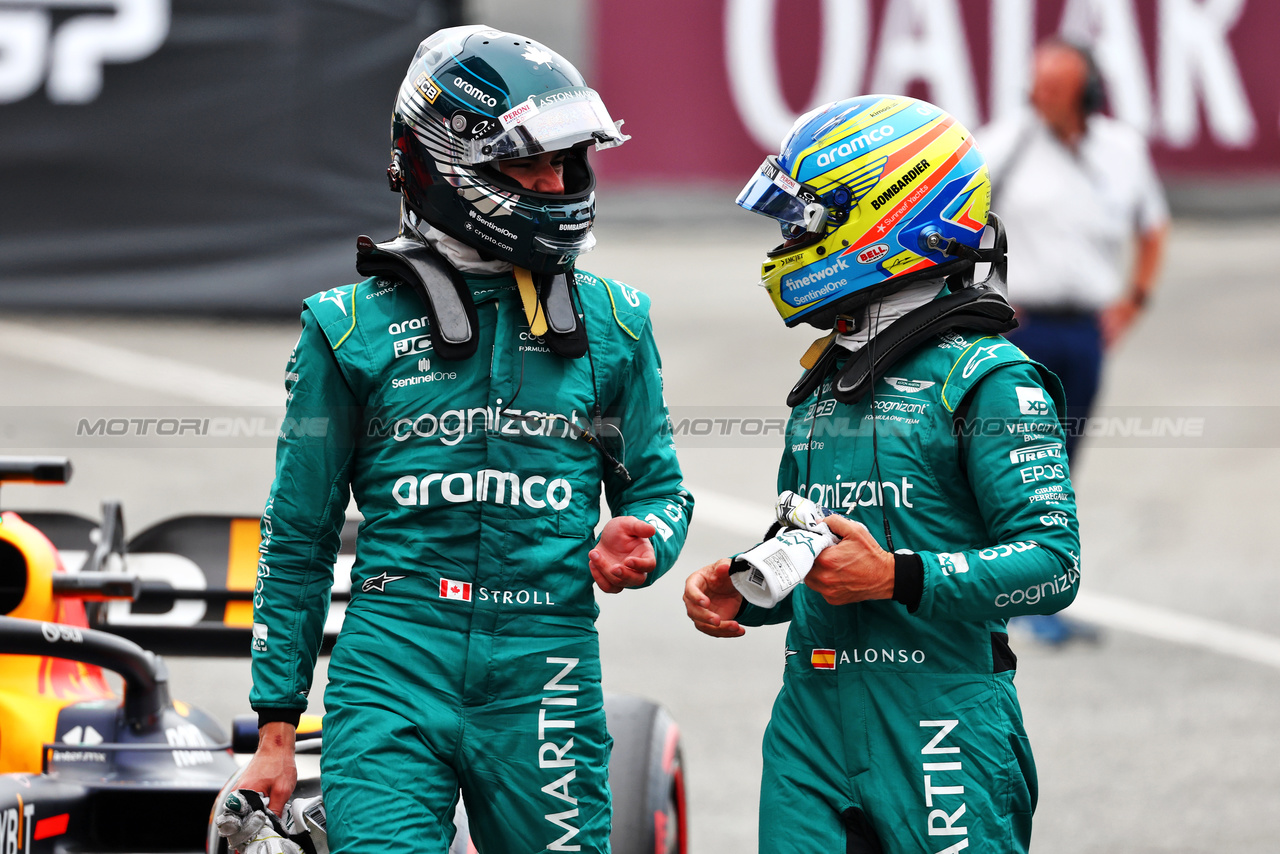 GP SPAGNA, (L to R): Lance Stroll (CDN) Aston Martin F1 Team e Fernando Alonso (ESP) Aston Martin F1 Team in qualifying parc ferme.

03.06.2023. Formula 1 World Championship, Rd 8, Spanish Grand Prix, Barcelona, Spain, Qualifiche Day.

 - www.xpbimages.com, EMail: requests@xpbimages.com ¬© Copyright: Coates / XPB Images