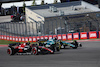 GP STATI UNITI, Zhou Guanyu (CHN) Alfa Romeo F1 Team C43 e Lance Stroll (CDN) Aston Martin F1 Team AMR23 battle for position.
22.10.2023. Formula 1 World Championship, Rd 19, United States Grand Prix, Austin, Texas, USA, Gara Day.
- www.xpbimages.com, EMail: requests@xpbimages.com © Copyright: Batchelor / XPB Images