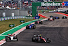 GP STATI UNITI, Zhou Guanyu (CHN) Alfa Romeo F1 Team C43 e Daniel Ricciardo (AUS) AlphaTauri AT04 battle for position.
22.10.2023. Formula 1 World Championship, Rd 19, United States Grand Prix, Austin, Texas, USA, Gara Day.
 - www.xpbimages.com, EMail: requests@xpbimages.com © Copyright: Coates / XPB Images