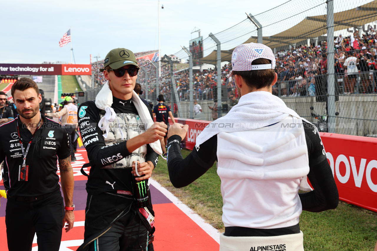 GP STATI UNITI, (L to R): George Russell (GBR) Mercedes AMG F1 with Pierre Gasly (FRA) Alpine F1 Team on the grid.

21.10.2023. Formula 1 World Championship, Rd 19, United States Grand Prix, Austin, Texas, USA, Sprint Day.

- www.xpbimages.com, EMail: requests@xpbimages.com © Copyright: Batchelor / XPB Images