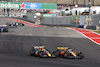 GP STATI UNITI, (L to R): Sergio Perez (MEX) Red Bull Racing RB19 e Oscar Piastri (AUS) McLaren MCL60 battle for position.
21.10.2023. Formula 1 World Championship, Rd 19, United States Grand Prix, Austin, Texas, USA, Sprint Day.
- www.xpbimages.com, EMail: requests@xpbimages.com © Copyright: Moy / XPB Images
