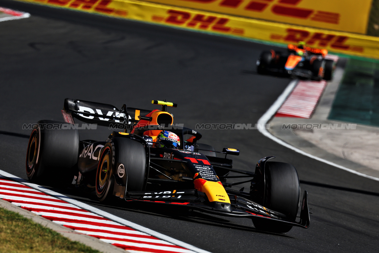 GP UNGHERIA, Sergio Perez (MEX) Red Bull Racing RB19.

23.07.2023. Formula 1 World Championship, Rd 12, Hungarian Grand Prix, Budapest, Hungary, Gara Day.

- www.xpbimages.com, EMail: requests@xpbimages.com © Copyright: Moy / XPB Images